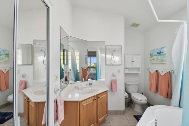 8961 A1A, Saint Augustine, FL 32080 - bathroom featuring tile patterned floors, vanity, and a tub to relax in