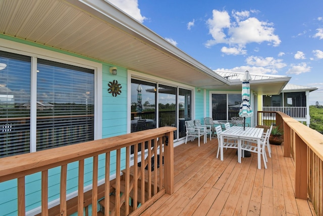 8961 A1A, Saint Augustine, FL 32080 - wooden terrace with outdoor dining area
