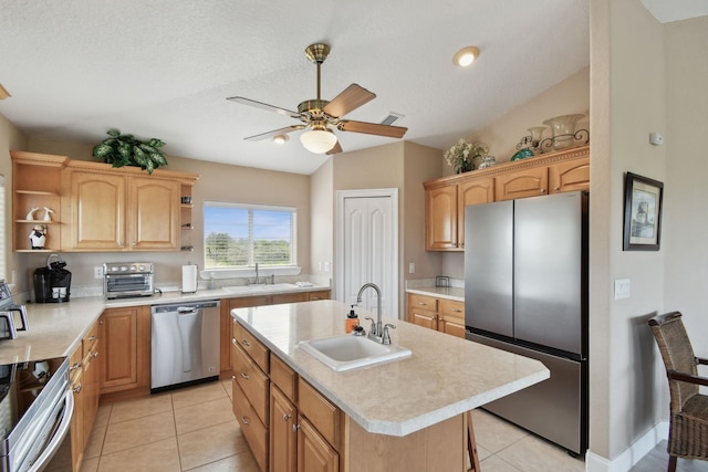 8961 A1A, Saint Augustine, FL 32080 - kitchen featuring stainless steel appliances, open shelves, light countertops, lofted ceiling, and a ceiling fan