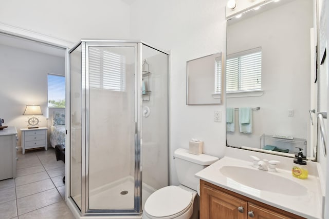8961 A1A, Saint Augustine, FL 32080 - bathroom with vanity, ensuite bathroom, a shower stall, and tile patterned flooring