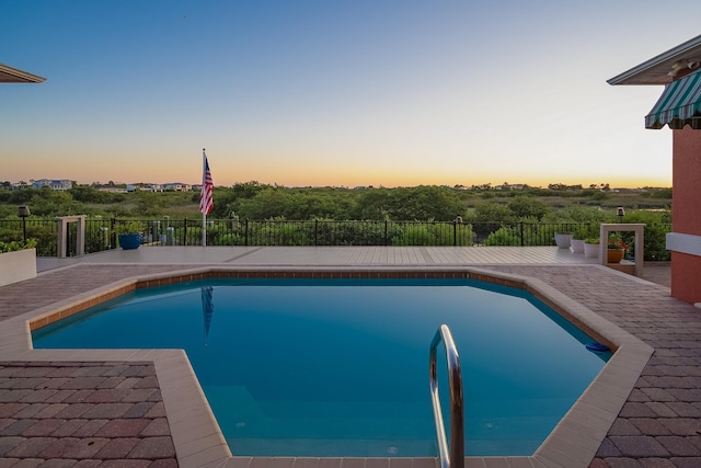 view of pool with a fenced in pool and fence