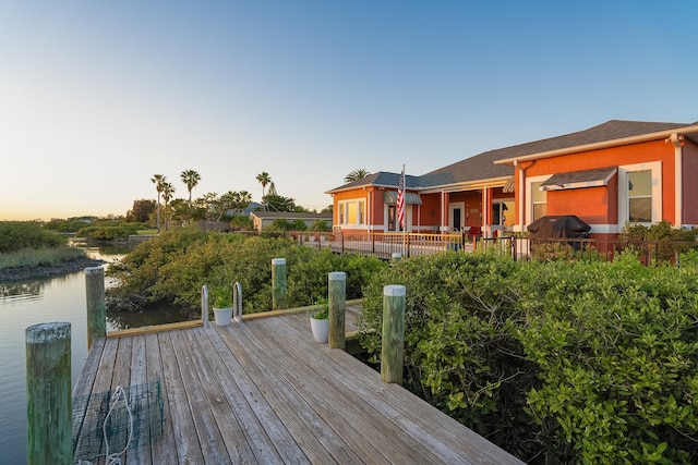 dock area featuring a water view