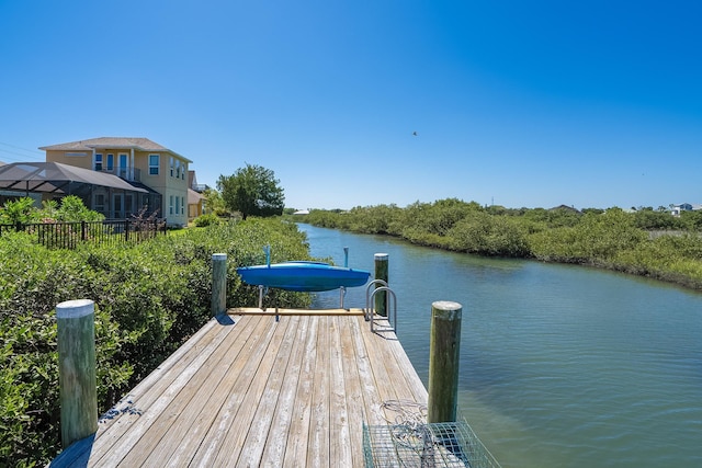 dock area featuring a water view