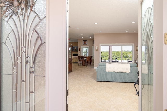 foyer entrance featuring recessed lighting