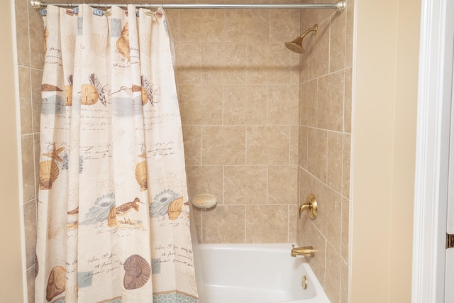 bathroom featuring shower / bathtub combination with curtain