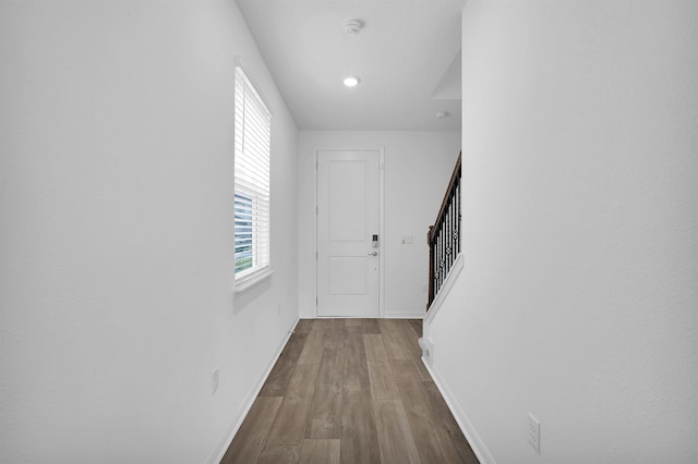 hallway with light wood-type flooring