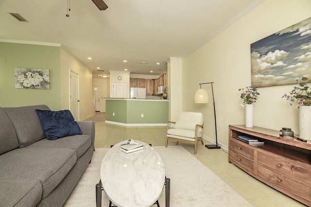 tiled living room featuring ceiling fan and ornamental molding