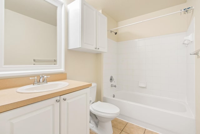 full bathroom featuring toilet, vanity, tile patterned floors, and shower / tub combination