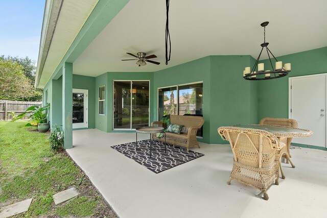 view of patio with ceiling fan