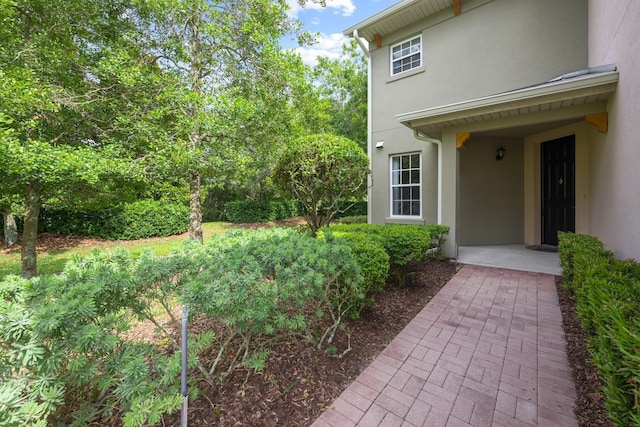 exterior space with stucco siding