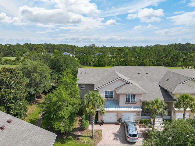 bird's eye view featuring a forest view