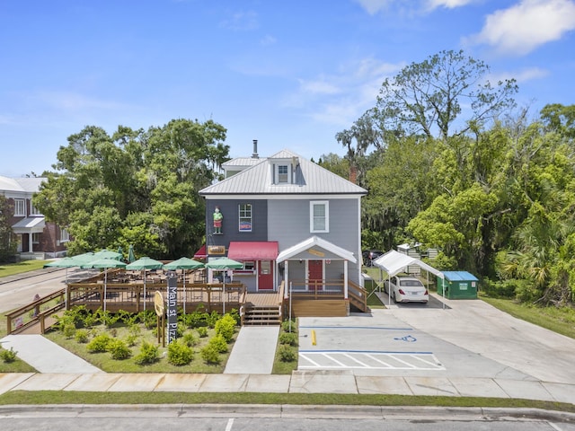 view of front of home with a wooden deck