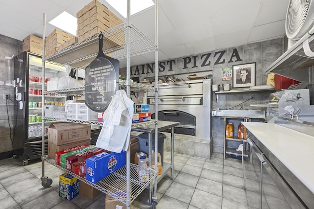 kitchen featuring a paneled ceiling