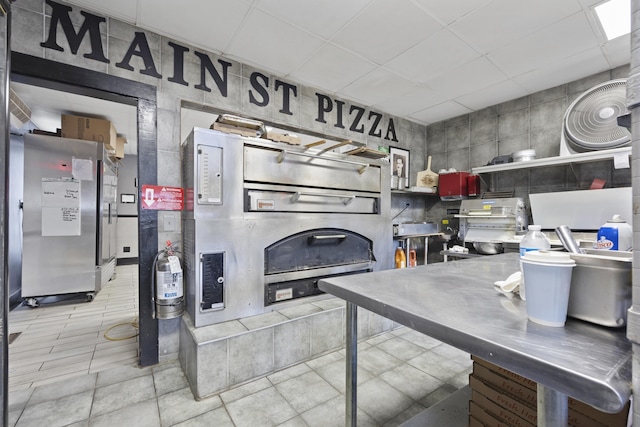 kitchen featuring stainless steel refrigerator