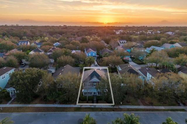 aerial view at dusk with a residential view