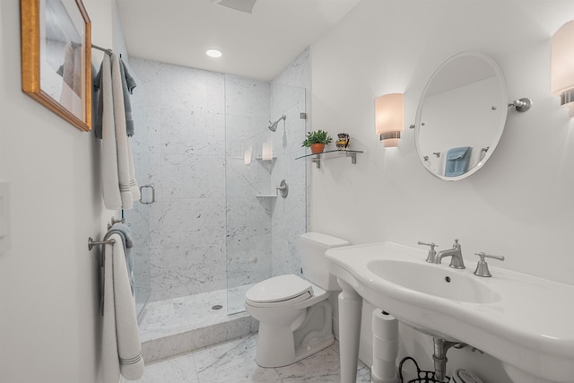 full bathroom featuring toilet, recessed lighting, a shower stall, and marble finish floor
