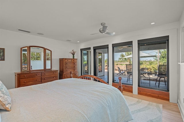 bedroom featuring visible vents, recessed lighting, light wood-style flooring, and access to exterior