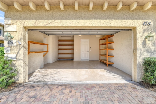 garage featuring driveway