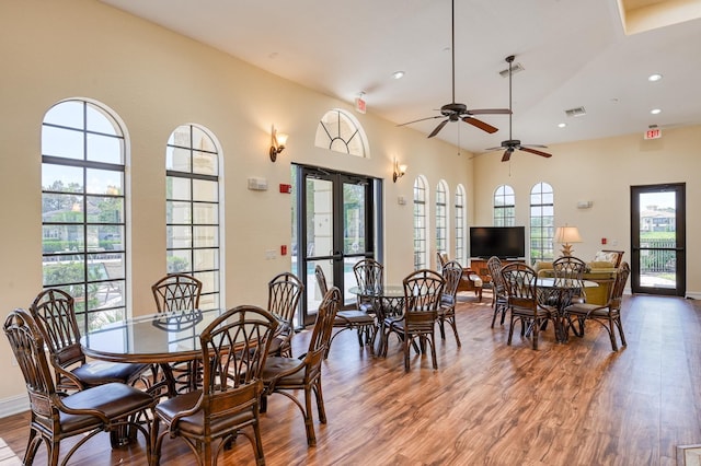 dining room with recessed lighting, visible vents, baseboards, and wood finished floors