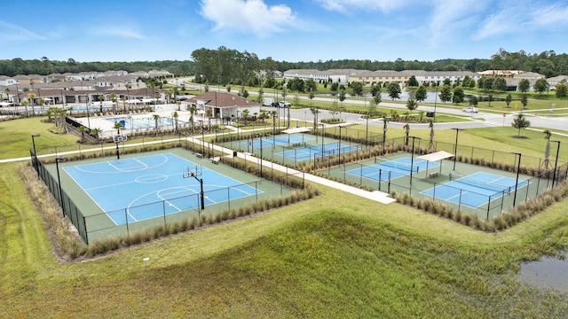313 Caminha Rd, Saint Augustine, FL 32084 - exterior space with a tennis court, community basketball court, and a residential view