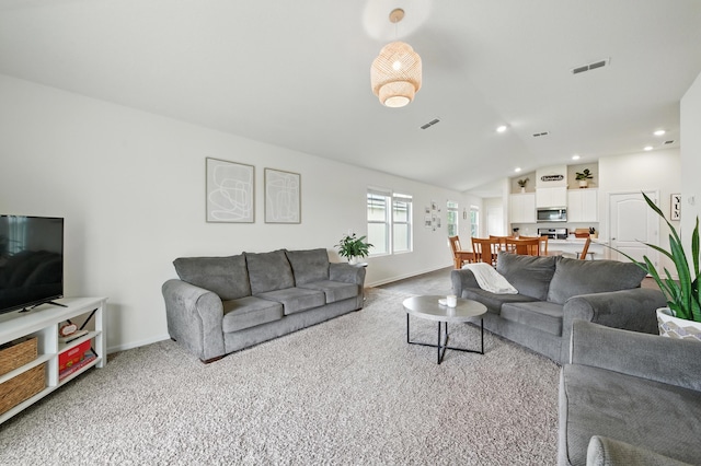 313 Caminha Rd, Saint Augustine, FL 32084 - carpeted living area featuring vaulted ceiling and recessed lighting