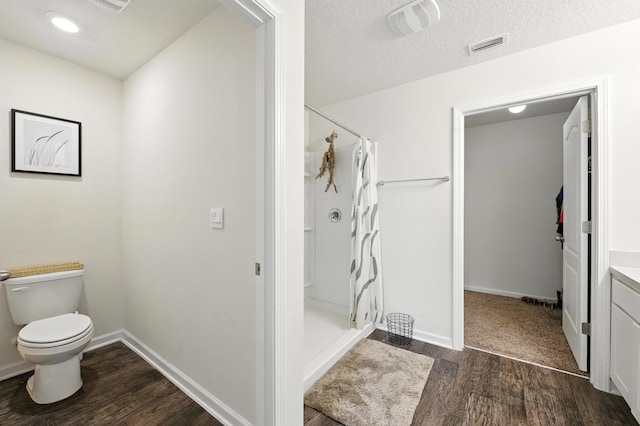313 Caminha Rd, Saint Augustine, FL 32084 - bathroom featuring wood finished floors, a shower with curtain, and vanity