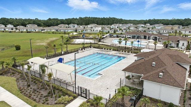 313 Caminha Rd, Saint Augustine, FL 32084 - community pool with a residential view and a patio