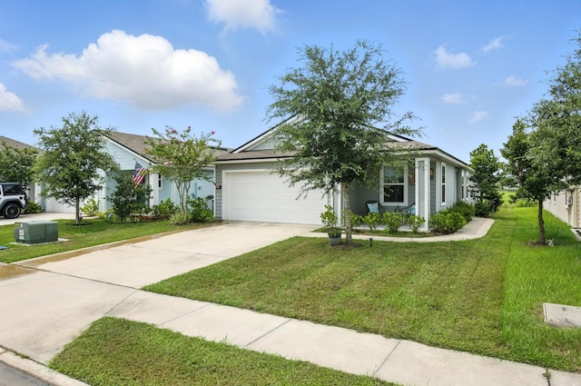 313 Caminha Rd, Saint Augustine, FL 32084 - view of front of property featuring a garage, driveway, and a front yard
