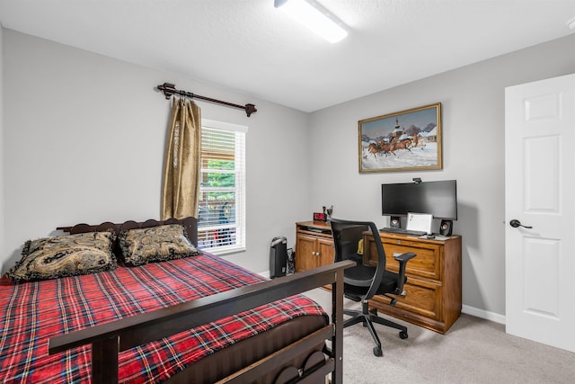 4 Contee Ct, Palm Coast, FL 32137 - carpeted bedroom featuring a desk and baseboards