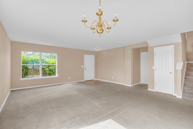 29 Louisville Dr, Palm Coast, FL 32137 - carpeted spare room with baseboards and a notable chandelier