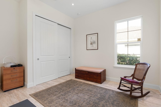 15 Cypresswood Dr, Palm Coast, FL 32137 - sitting room featuring baseboards and light wood-style flooring