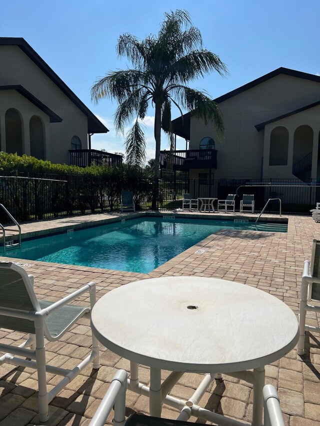 view of pool featuring a patio area