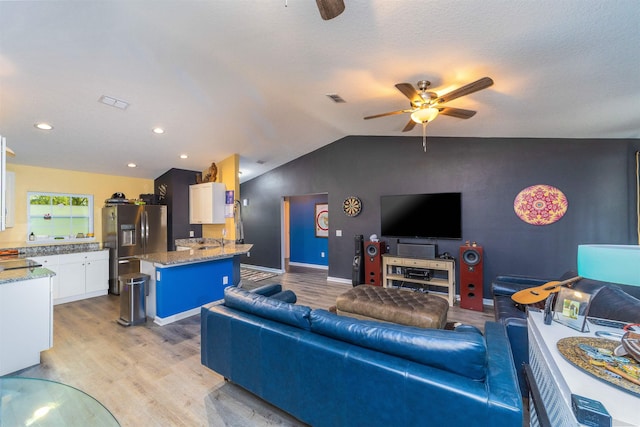 4420 Cedar Ford Blvd, Hastings, FL 32145 - living room featuring ceiling fan, light wood finished floors, vaulted ceiling, and recessed lighting