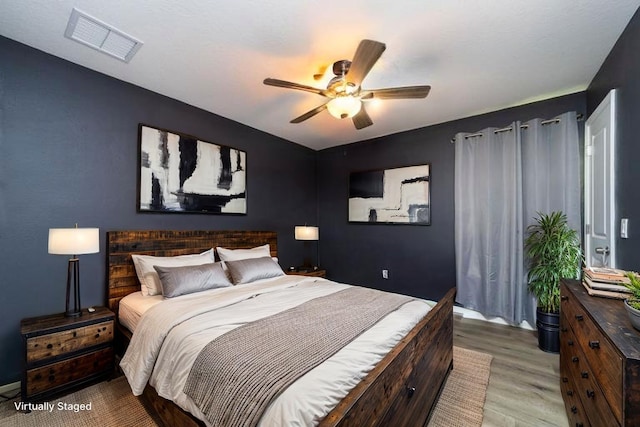 4420 Cedar Ford Blvd, Hastings, FL 32145 - bedroom featuring wood finished floors and a ceiling fan