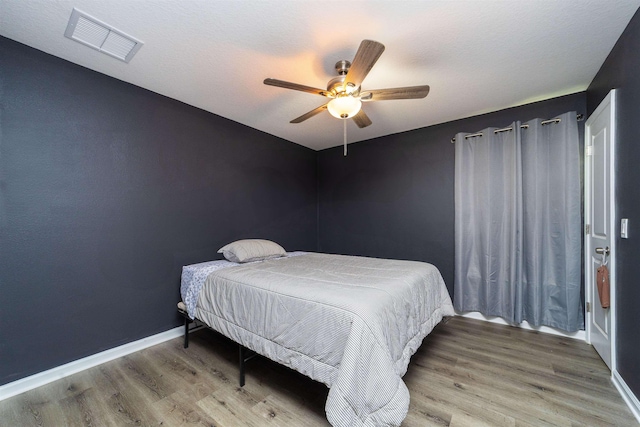 4420 Cedar Ford Blvd, Hastings, FL 32145 - bedroom featuring wood finished floors and a ceiling fan