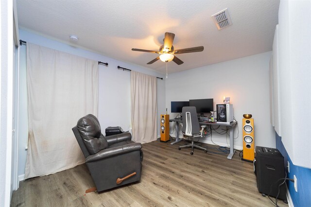 4420 Cedar Ford Blvd, Hastings, FL 32145 - home office featuring light wood finished floors and a ceiling fan