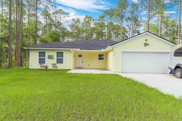 4420 Cedar Ford Blvd, Hastings, FL 32145 - ranch-style home with an attached garage, a front lawn, and driveway