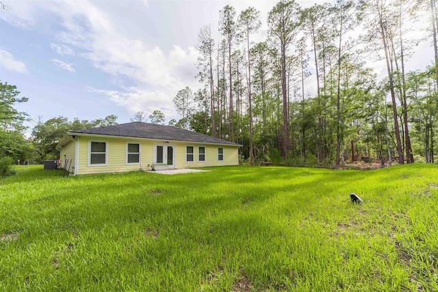 4420 Cedar Ford Blvd, Hastings, FL 32145 - back of house featuring a lawn