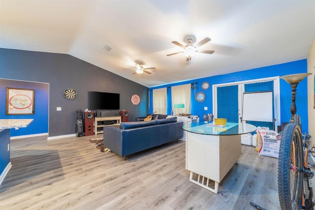 4420 Cedar Ford Blvd, Hastings, FL 32145 - living room featuring lofted ceiling, a ceiling fan, and light wood-style flooring