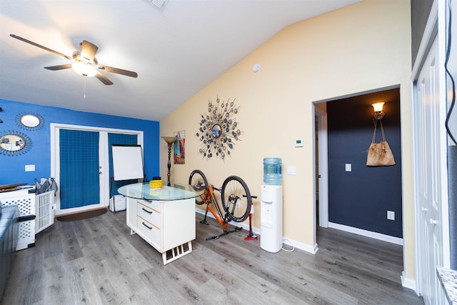 4420 Cedar Ford Blvd, Hastings, FL 32145 - kitchen with ceiling fan, white cabinets, light wood finished floors, vaulted ceiling, and light countertops