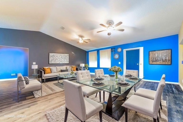 4420 Cedar Ford Blvd, Hastings, FL 32145 - dining space featuring wood finished floors, ceiling fan, and vaulted ceiling