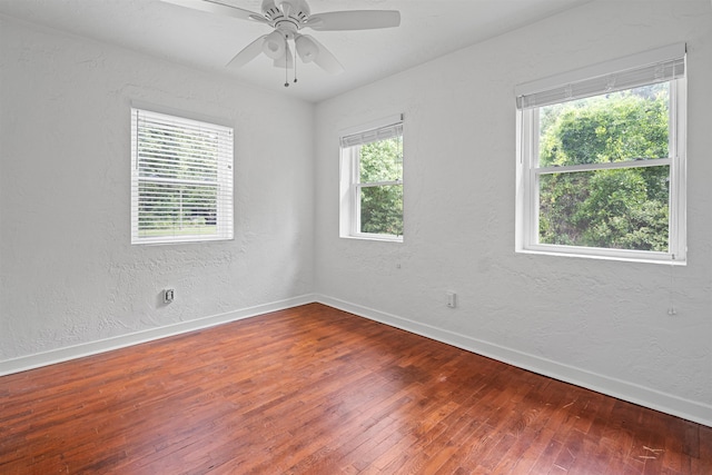 1316 NE 9th St, Gainesville, FL 32605 - spare room featuring wood-type flooring, a textured wall, and ceiling fan