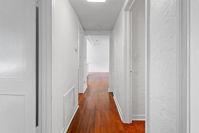 1316 NE 9th St, Gainesville, FL 32605 - hallway featuring a textured wall and wood finished floors