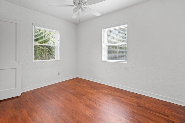1316 NE 9th St, Gainesville, FL 32605 - unfurnished room featuring healthy amount of natural light, hardwood / wood-style flooring, ceiling fan, and a textured wall