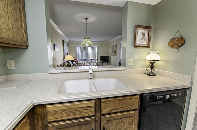 kitchen featuring sink, crown molding, hanging light fixtures, and dishwasher