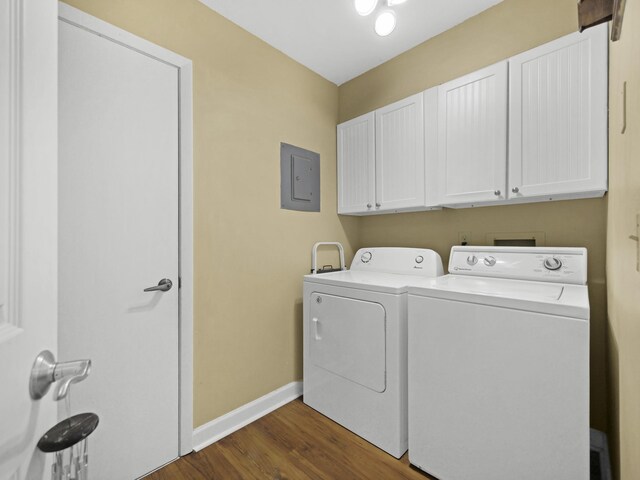 890 A1A Beach Blvd Unit 3, Saint Augustine, FL 32080 - washroom featuring cabinet space, baseboards, washer and clothes dryer, dark wood-style flooring, and electric panel
