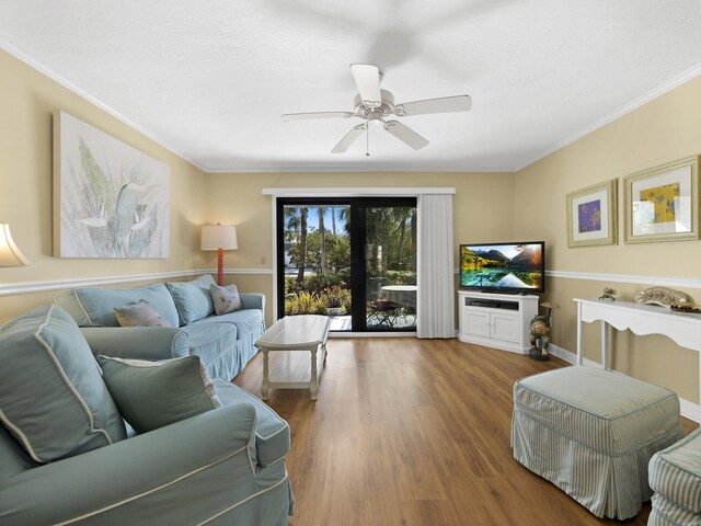 890 A1A Beach Blvd Unit 3, Saint Augustine, FL 32080 - living room featuring wood finished floors, crown molding, and ceiling fan
