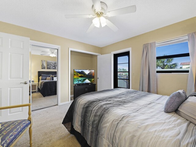 890 A1A Beach Blvd Unit 3, Saint Augustine, FL 32080 - bedroom with carpet, a ceiling fan, two closets, and baseboards