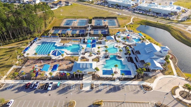 bird's eye view with a water view