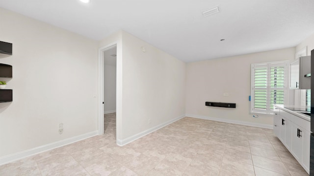 interior space featuring light tile patterned flooring